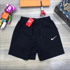 Two knicker(adidas&Nike)a Nike slide foot wear.